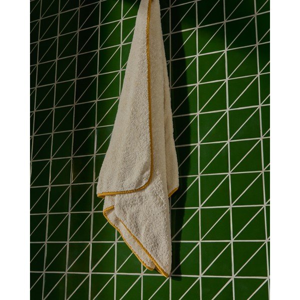 Żółty/biały bawełniany ręcznik kąpielowy frotte 70x140 cm Sedora – Kave Home-image-1