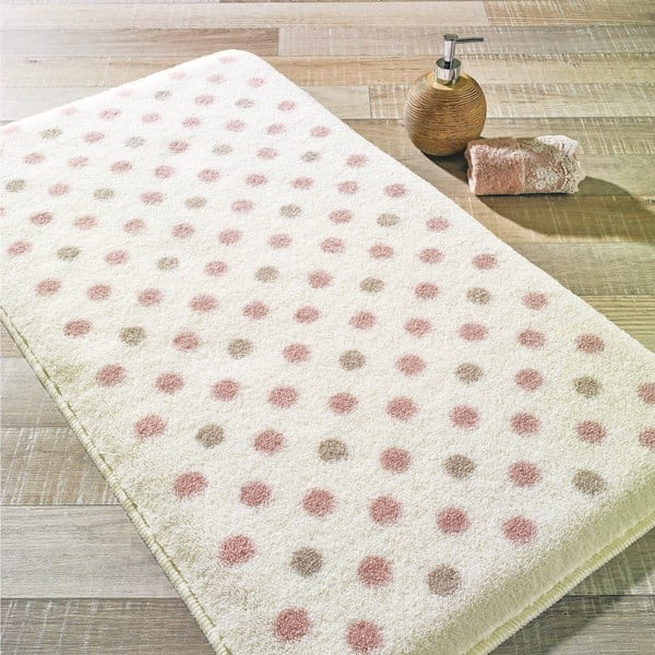 Pudrowo-różowy dywanik łazienkowy Polka, 57x100 cm