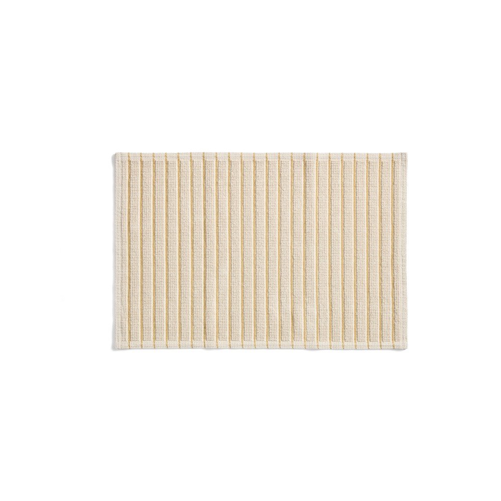 Żółty/beżowy tekstylny dywanik łazienkowy 50x80 cm Merade – Kave Home