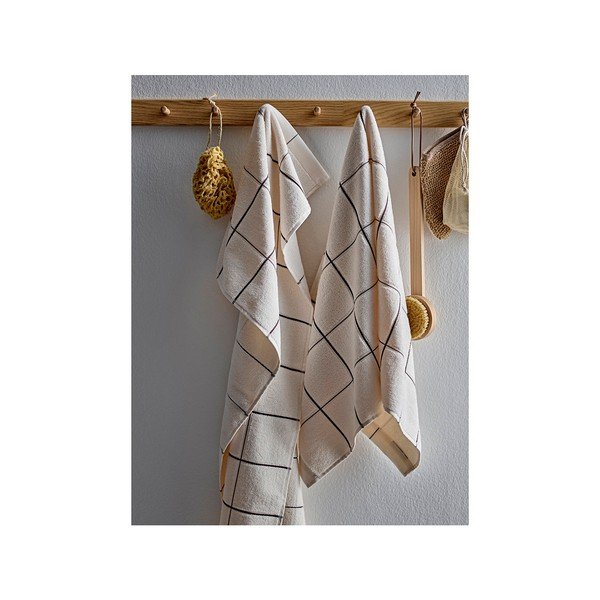 Ręcznik z bawełny organicznej frotte w kolorze kości słoniowej 50x100 cm Vista – Södahl-image-1