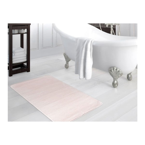 Jasnoróżowy dywanik łazienkowy Noah, 70x110 cm