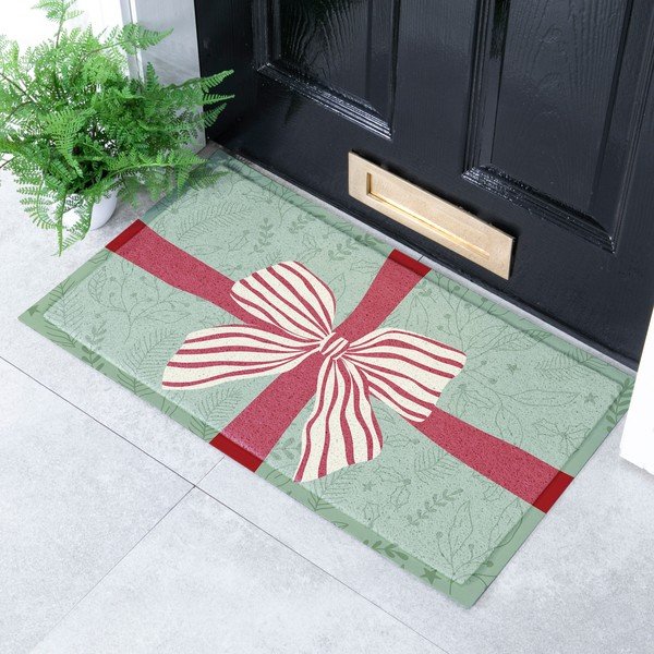 Wycieraczka ze świątecznym motywem z plastiku z recyklingu 40x70 cm Red & White Stripe Bow – Artsy Doormats-image-1