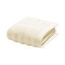 Kremowy bawełniany ręcznik frotte 30x50 cm Maya – douceur d'intérieur