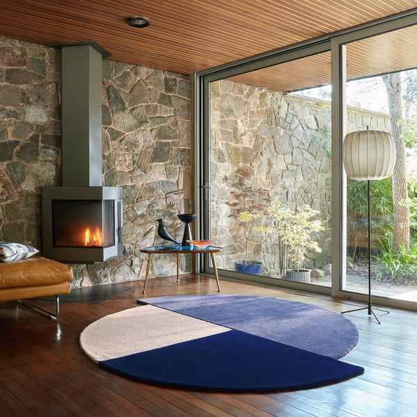 Niebieski wełniany okrągły dywan tkany ręcznie ø 150 cm Mia Segment – Flair Rugs-image-1