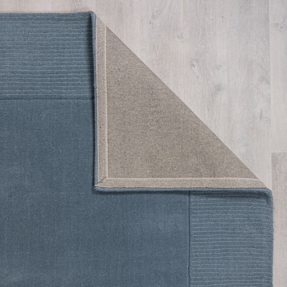 Ciemnoniebieski wełniany dywan tkany ręcznie 120x170 cm Textured Wool Border – Flair Rugs (zdjęcie 4)