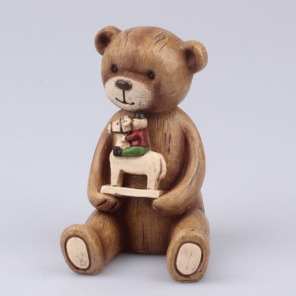 Figurka dekoracyjna niedźwiadek z konikiem Dakls 