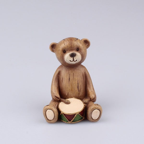 Figurka dekoracyjna niedźwiadek z bębenkiem Dakls 