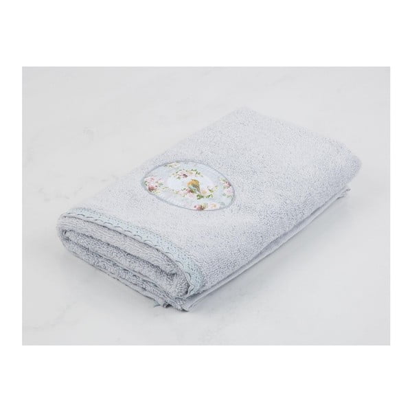 Jasnoniebieski ręcznik bawełniany Madame Coco Flowy, 50x76 cm