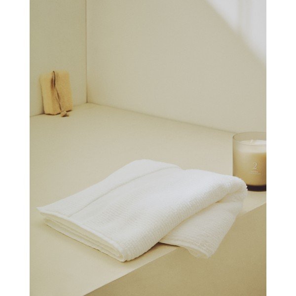 Biały bawełniany ręcznik frotte 30x50 cm Olvira – Kave Home-image-1