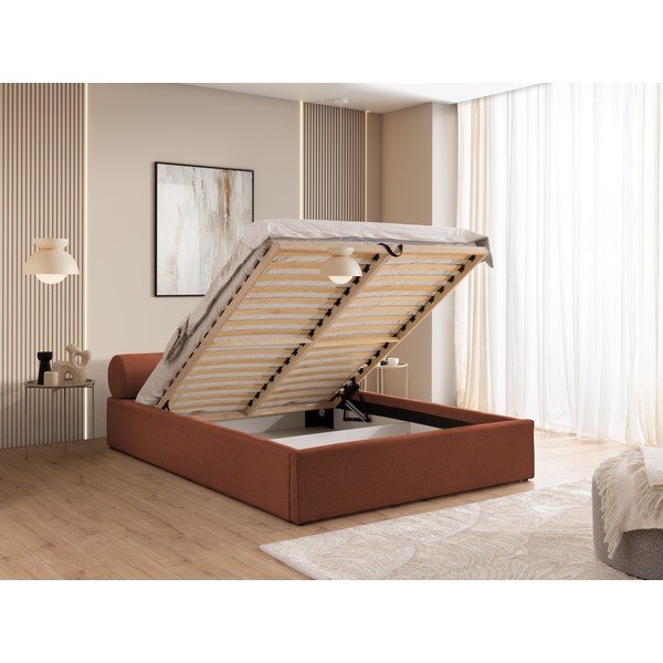 Tapicerowane łóżko dwuosobowe ze schowkiem i stelażem 180x200 cm w kolorze terakoty Cille – Ropez-image-4