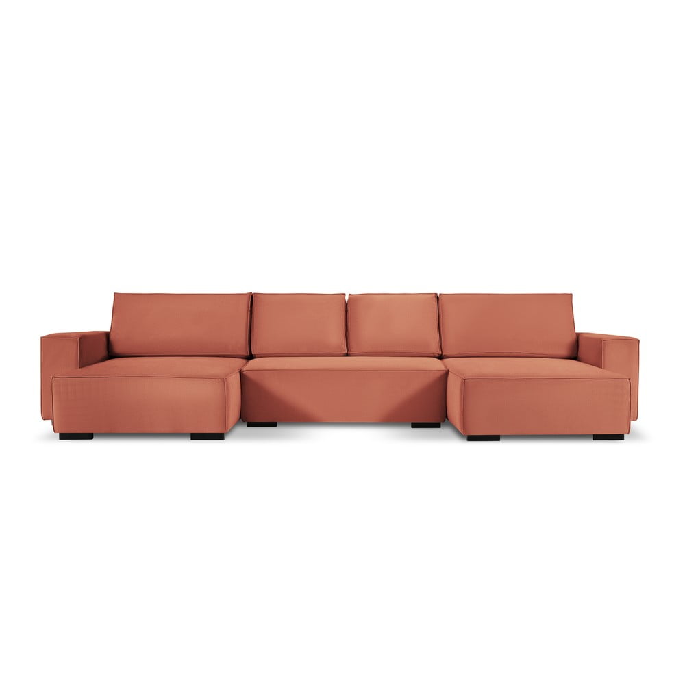 Różowa sztruksowa rozkładana sofa w kształcie 